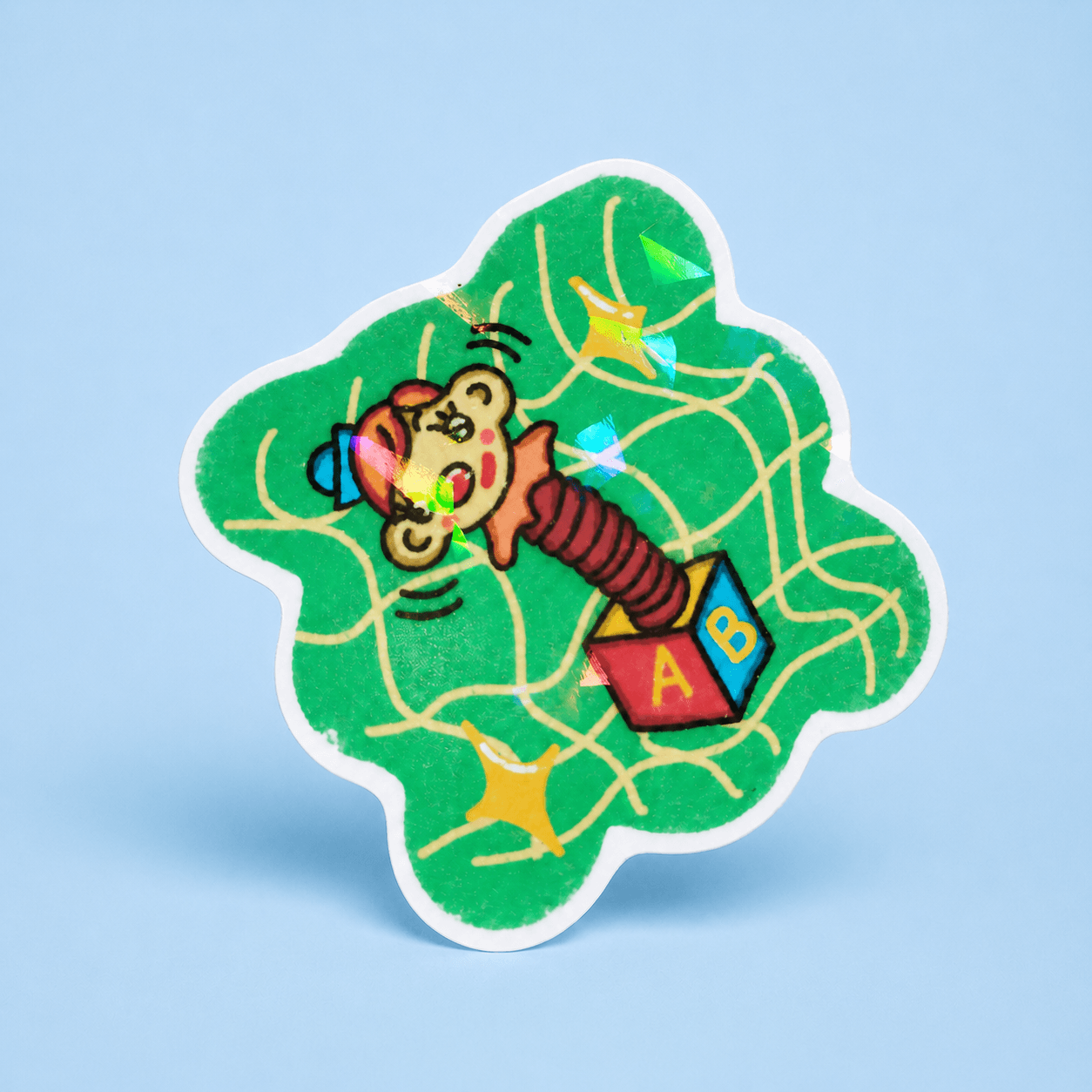 Adesivo 5cm Macaquinho Caixa de Surpresa